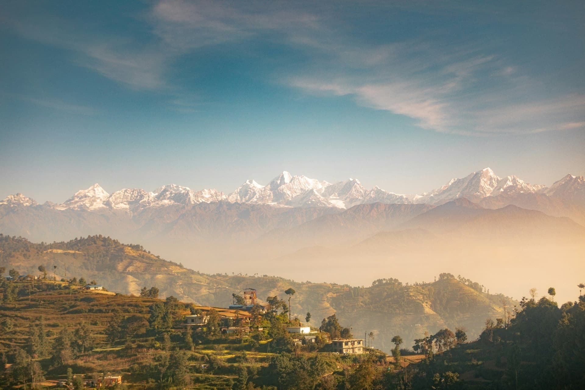 Forested foothills rising to the Nepali Himalaya